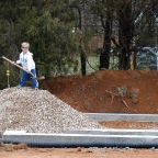 Casey helping with the greenhouse construction